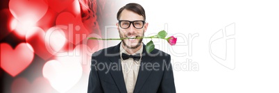 Valentines man biting rose with love hearts background