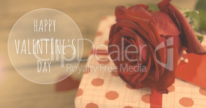 Happy Valentine's Day text and rose with gift