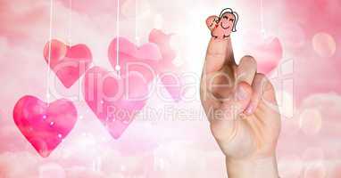 Valentine's fingers love couple and hanging hearts
