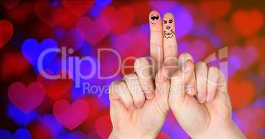 Valentine's fingers love couple and colorful blurred heart lights