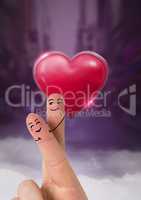 Valentine's fingers love couple and Shiny heart glowing with purple city misty background