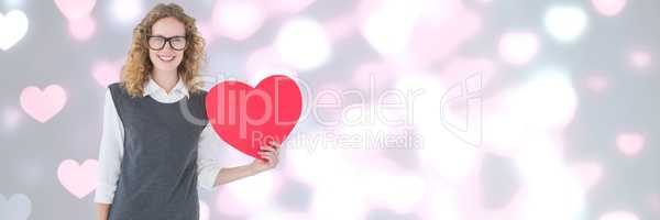 Valentines lady holding heart with love hearts background