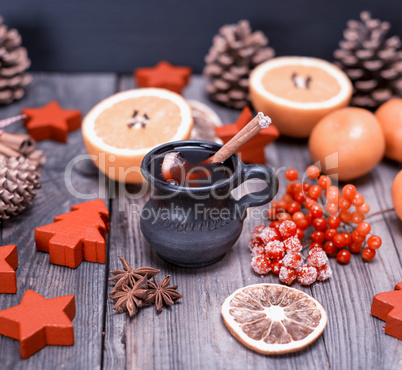 mulled wine in a brown ceramic mug