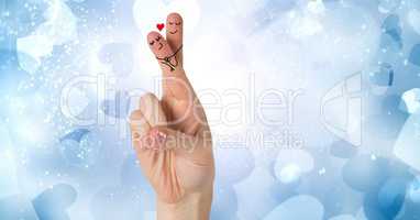 Valentine's fingers love couple and blue hearts