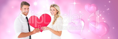 Valentines couple holding heart and love hearts background