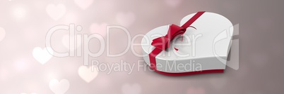 Valentines heart shaped gift box and love hearts background