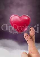 Valentine's fingers love couple and Shiny heart glowing with purple misty background