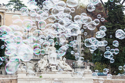 Soap bubbles in piazza del Popolo in Rome