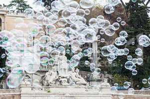 Soap bubbles in piazza del Popolo in Rome