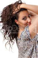Beautiful young woman touching the hair