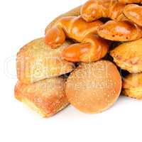 Cereal bread, croissants and sweet pastries isolated on white ba