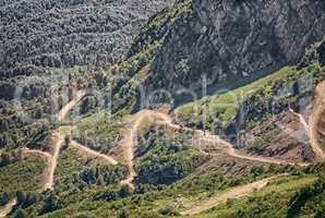 Mountain landscape: a winding road on the mountainside.