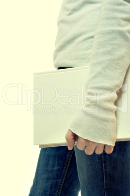 Young girl with book on white background