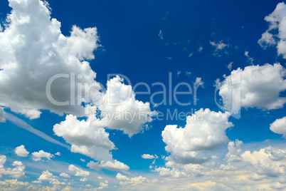 Heavenly landscape. Cumulus clouds in blue sky.