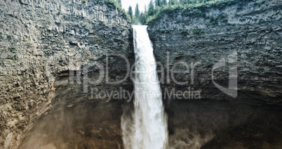 Waterfall in the void and stone