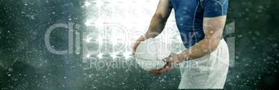 Composite image of rugby player about to throw the rugby ball