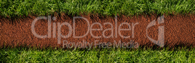 Composite image of line running through the grass