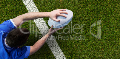 Composite image of a rugby player scoring a try