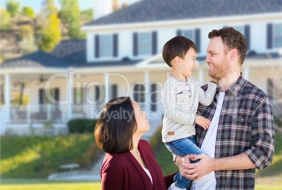 Young Mixed Race Caucasian and Chinese Family In Front of Custom