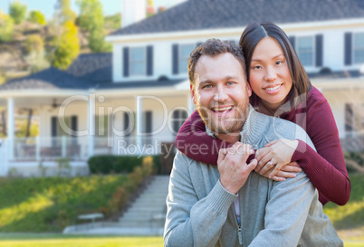 Mixed Race Caucasian and Chinese Couple In Front Yard of Beautif