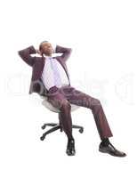 African business man relaxing on chair