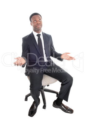 Sitting business man is confused, wondering