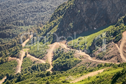 Mountain landscape: a winding road on the mountainside.