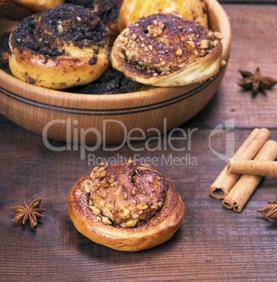 baked round buns with poppy seeds and nuts