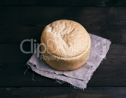 round yeast bread baked from white wheat flour