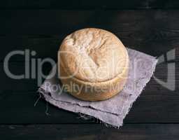 round yeast bread baked from white wheat flour