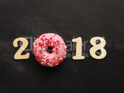Sweet 2018 with a pink donut