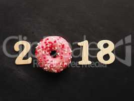 Sweet 2018 with a pink donut