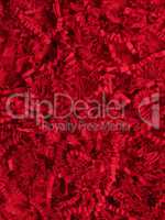 Abstract red texture of shredded paper