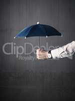 Businessman with an umbrella