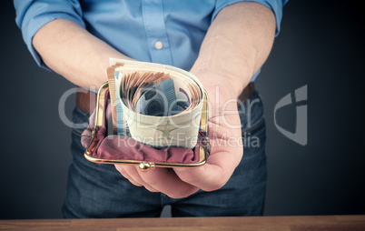 Businessman with an open wallet