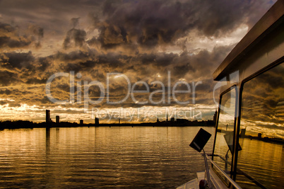 view of Old Riga from the boat at dawn