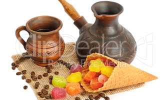 Coffee pot, cup of coffee, jujube and waffles isolated on white