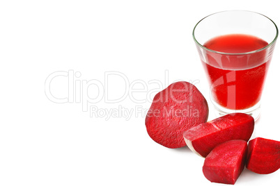 Red beet and fresh juice in a glass isolated on white background