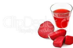 Red beet and fresh juice in a glass isolated on white background