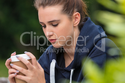 Sad Teenager Young Woman Drinking Coffee Outside