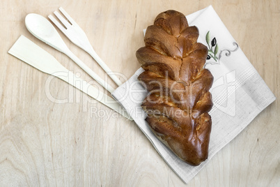 Appetizing sweet white bread on a napkin.