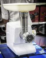 Modern electric meat grinder appliances store.