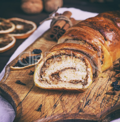 baked roll with cinnamon and nuts