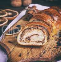 baked roll with cinnamon and nuts