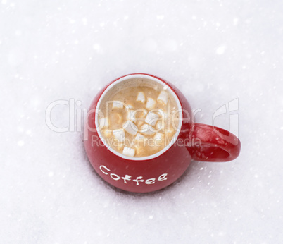 red cup with hot coffee and marshmallow