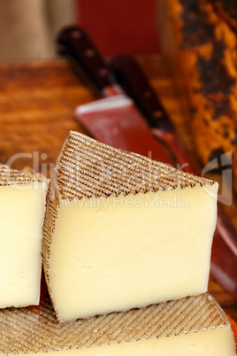 Wedge of Manchego cheese.