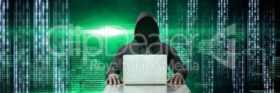 Anonymous hacker with computer code binary interface in city