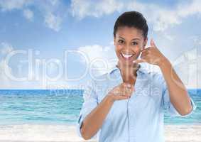 woman smiling and pointing with ring me sign