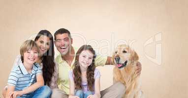 Family with dog and orange background