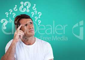 Confused man frowning and scratching his head looking up with question marks